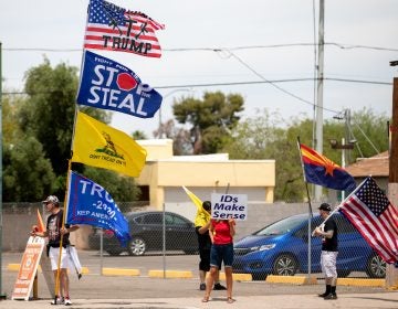 Demonstrators in support of former President Donald Trump gather on May 1 outside the Arizona Veterans Memorial Coliseum in Phoenix, where a controversial 2020 general election review was set to begin. Trump has heartily supported the audit. (Courtney Pedroza/Getty Images)