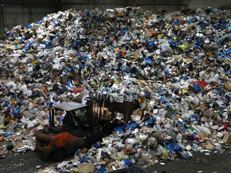Pandemic Paralyses South Korea’s Plastics Recycling Industry A worker operates a forklift to move household waste at a facility that stores recyclable materials