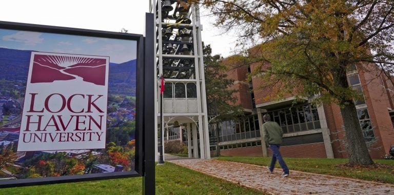 A student walks on the Lock Haven University campus in Lock Haven, Pa, Saturday, Oct. 31, 2020. (Gene J. Puskar/AP Photo)