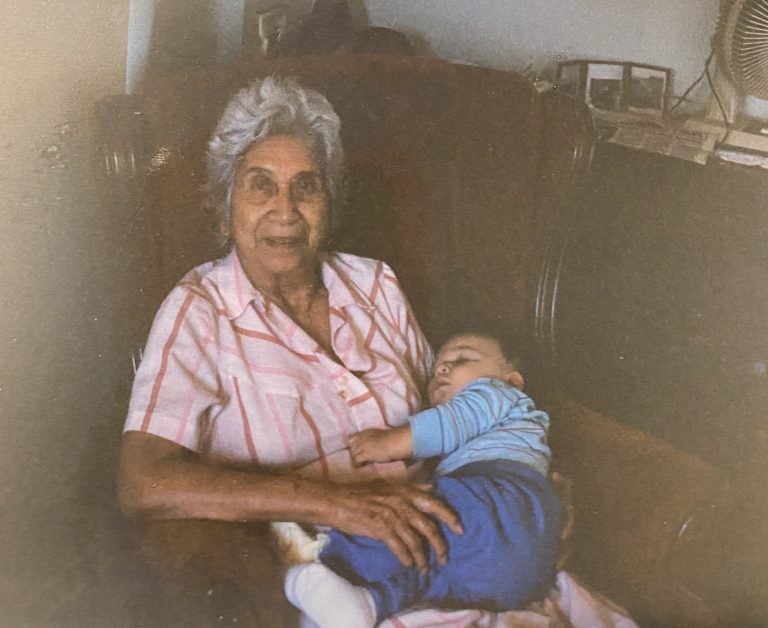 Sean Brown (Seminole Nation of Oklahoma) as an infant with his great-grandmother, Mable Brown (Mama-on), who would tell him countless stories about the people he came from. (Photo courtesy of Sean Brown)