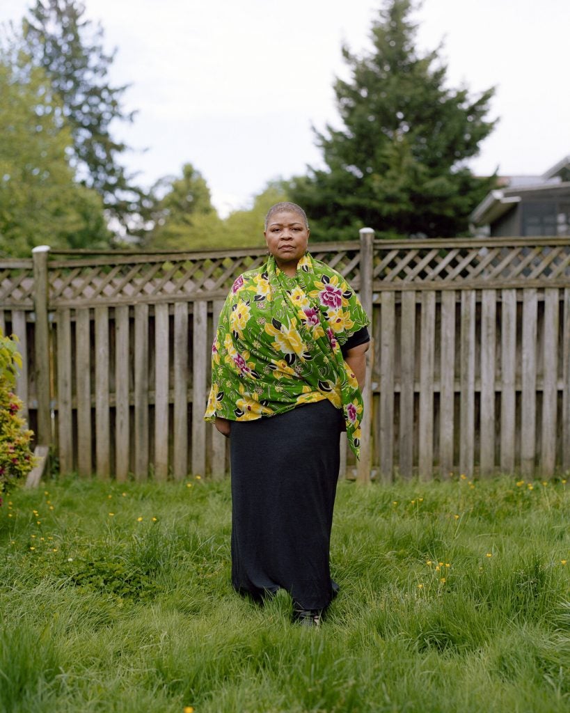 Anneliese M. Bruner stands in a yard outside