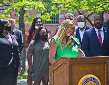 ity Councilmember Jamie Gauthier speaks from a podium