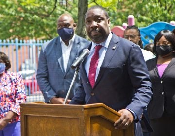 Kenyatta Johnson at a podium.