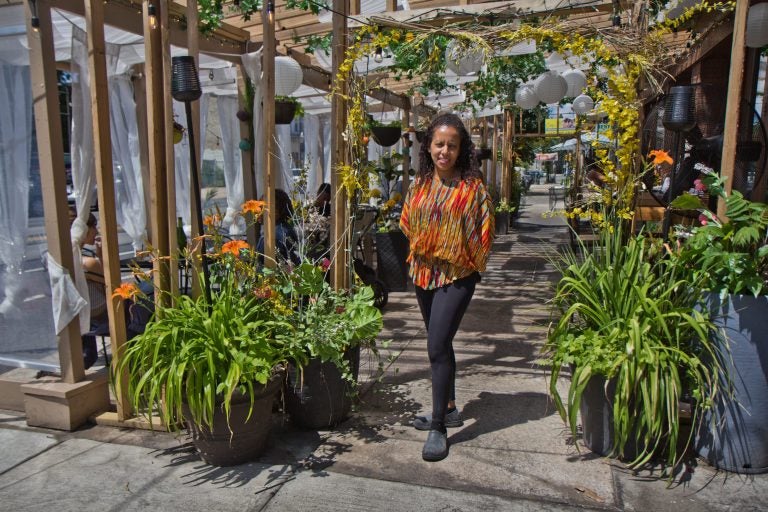 Saba Tedla is the owner of Booker’s Restaurant and Bar on Baltimore Avenue in West Philadelphia. (Kimberly Paynter/WHYY)