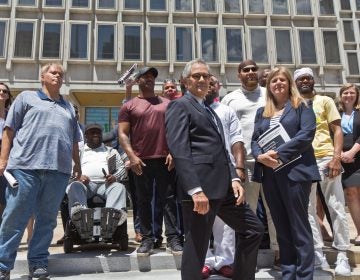 Philadelphia District Attorney Larry Krasner, the office’s CIU (Conviction Integrity Unit), and exonerees stood at the site of the statue of former Philadelphia Mayor Frank Rizzo, which was removed from Thomas Paine Plaza last year, calling the release of a report on wrongful convictions in the city on June 15, 2021, “an end of an era.” (Kimberly Paynter/WHYY)