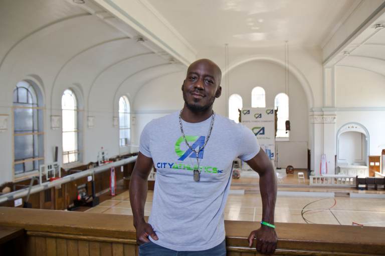In 2020, Curt DeVeaux and partners converted an old church space into a recreation center for kids in North Philadelphia. DeVeaux, 42, is a father of 5 and has been involved in youth sports for the past 10 years. (Kimberly Paynter/WHYY)