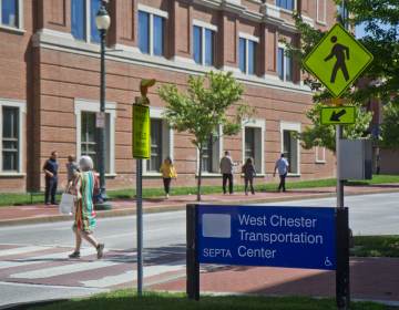 The exterior of the West Chester transportation building alongside a crosswalk