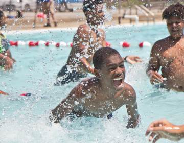 Kids swim at the James Finnegan Playground pool