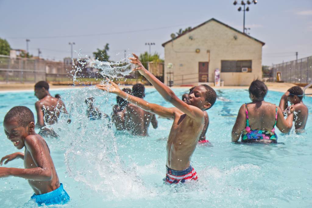 Kids swim at the James Finnegan Playground pool