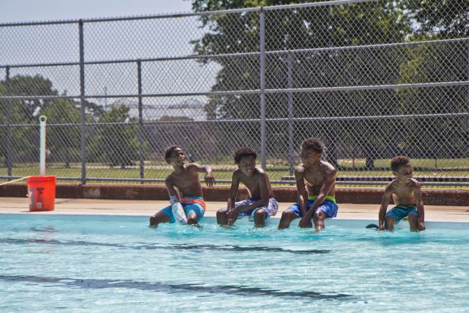 Kids at the James Finnegan Playground pool