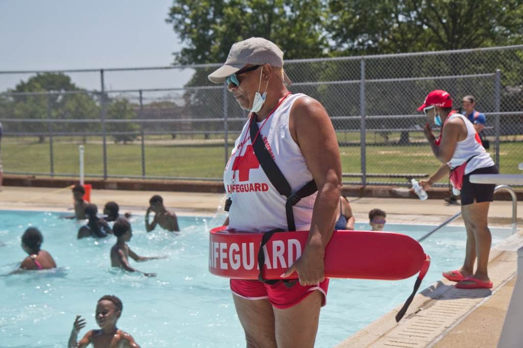 Lifeguards keep an eye on swimmers at a Philly pool