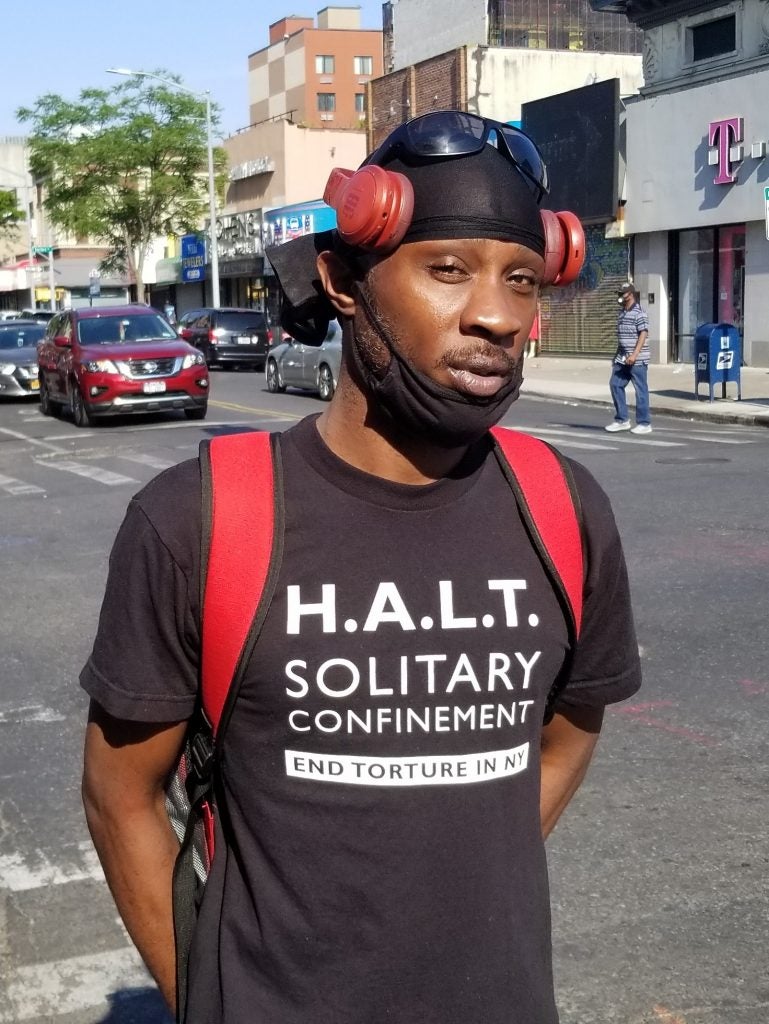 Aaron Hinton stands outside in Brooklyn