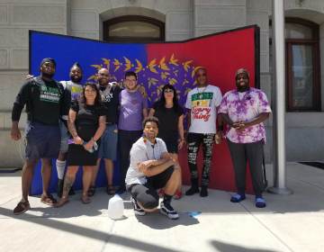 Members of ad hoc group reimagining a new Pride in Philly. L - R: Maso Kibble, Diamond Anthony, Jessica Kallup, Manny Frank-Lampon, Rich Frank-Lampon, André Henson aka Alzei Barbei Mizrahi, Elicia Gonzales, Jamaal Henderson, and Abdul-Aliy Muhammad. (Peter Crimmins / WHYY)