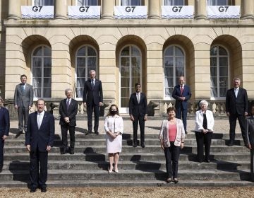 From left, EU's Economy Commissioner Paolo Gentiloni, Eurogroup President Paschal Donohoe, World Bank President David Malpass, Italy's Finance Minister Daniele Franco, French Finance Minister Bruno Le Maire, Canada's Finance Minister Chrystia Freeland, Britain's Chancellor of the Exchequer Chancellor Rishi Sunak, Managing Director of the IMF Kristalina Georgieva, Germany's Finance Minister Olaf Scholz, U.S. Treasury Secretary Janet Yellen, Secretary-General of the Organisation for Economic Co-operation and Development (OECD) Mathias Cormann, Japan's Finance Minister Taro Aso pose for a family photo as finance ministers from across the G7 nations meet at Lancaster House in London, Saturday, June 5, 2021 ahead of the G7 leaders' summit. (Henry Nicholls/Pool Photo via AP)