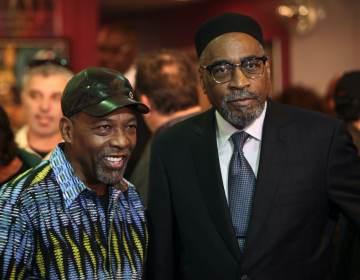 Kenny Gamble, right, and Leon Huff pose for a photo