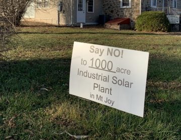 One of the many signs protesting a proposed solar project in Mount Joy Township, Adams County is seen here in front of the Iron Horse Inn on Nov. 24, 2020. Owner Tom Newhart said the project could hurt the tourism industry in the area, just outside Gettysburg. (Rachel McDevitt / StateImpact Pennsylvania)
