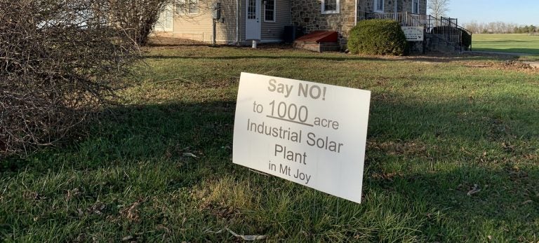 One of the many signs protesting a proposed solar project in Mount Joy Township, Adams County is seen here in front of the Iron Horse Inn on Nov. 24, 2020. Owner Tom Newhart said the project could hurt the tourism industry in the area, just outside Gettysburg. (Rachel McDevitt / StateImpact Pennsylvania)