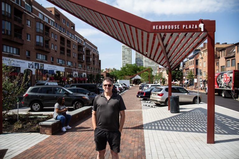 Mike Harris, Executive Director of the South Street Headhouse District, said the redesign of Headhouse Plaza added 8 new ADA ramps, a walkway, expanded curb lines and added lighting to the block. (Kimberly Paynter/WHYY)