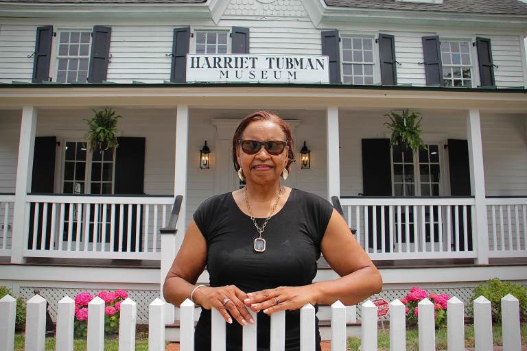 Lynda Anderson-Towns stands outside the museum on Lafayette Street