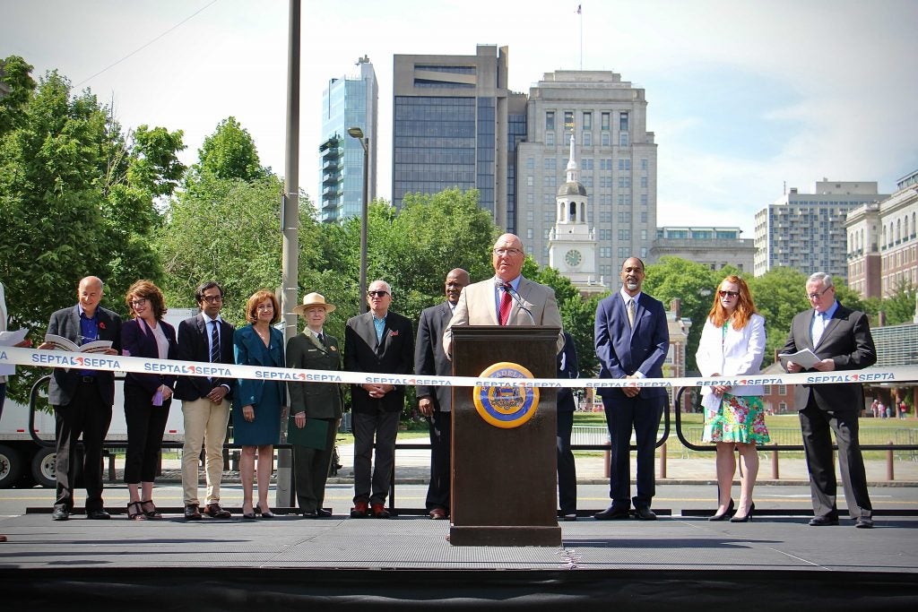 SEPTA Board Chairman Pat Deon speaks from behind a podium