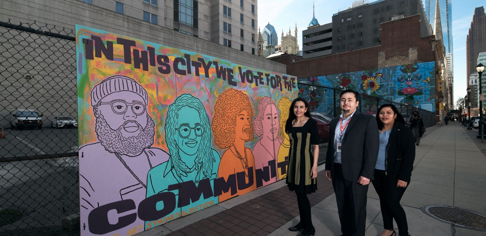 Steven Larín, accompanied by NSC board member and former client Vivian Echeverría Quiroga (left), and NSC client María Moz (right)