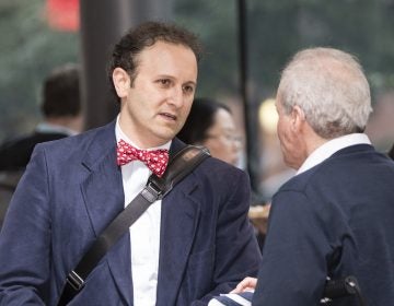 Dr. Aaron Kesselheim (left), a professor at Harvard Medical School, at a documentary film screening in 2018 in Boston. He has resigned from a Food and Drug Administration advisory panel over the FDA's decision to approve an Alzheimer's drug. (Scott Eisen/AP Images for AIDS Healthcare Foundation)