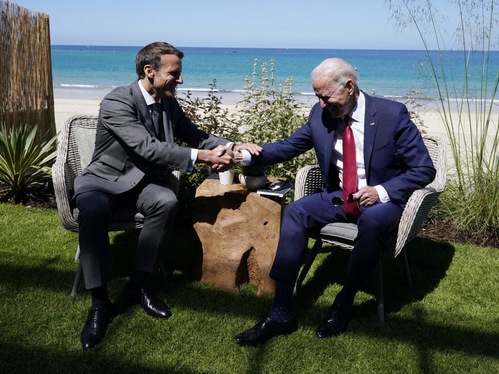 President Joe Biden sits down with and French President Emmanuel Macron