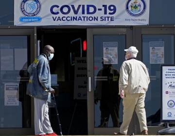 A COVID-19 vaccination clinic last month in Auburn, Maine. A drop in life expectancy in the U.S. stems largely from the coronavirus pandemic, a new study says. (Robert F. Bukaty/AP)