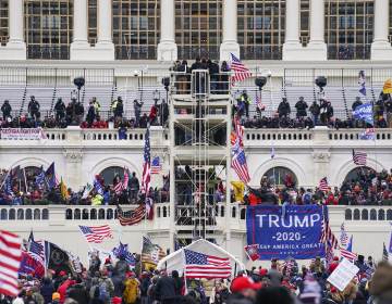 File photo: Insurrectionists loyal to former President Donald Trump breach the U.S. Capitol in Washington on Jan. 6.  (John Minchillo/AP)