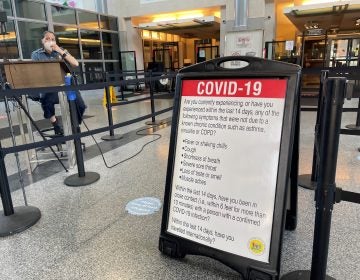 Anybody entering the courthouse in Wilmington must under screening for  COVID-19  symptoms. (Cris Barrish/WHYY) 