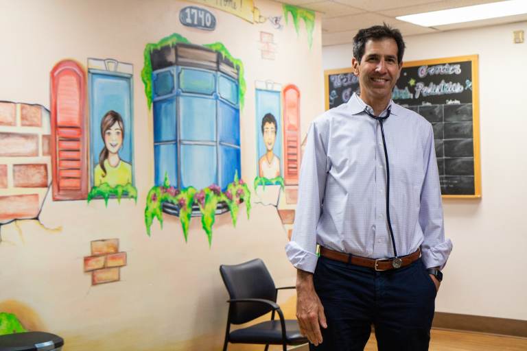 Dr. Eric Berger stands inside his Center City Pediatrics office