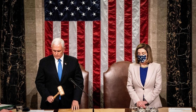 Then-Vice President Mike Pence and House Speaker Nancy Pelosi preside over a joint session of Congress