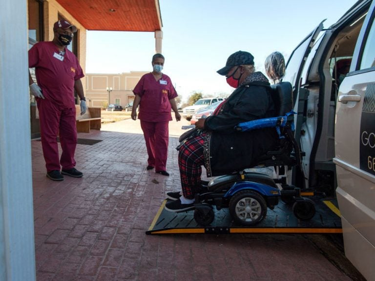 Poverty and disability are linked to lower vaccination rates in some rural communities. The Vaccination Transportation Initiative sponsored van helps rural residents get the COVID-19 vaccine in rural Mississippi. The effort works to overcome the lack of transportation and access to technology for rural residents. (Rory Doyle/Bloomberg via Getty Images)