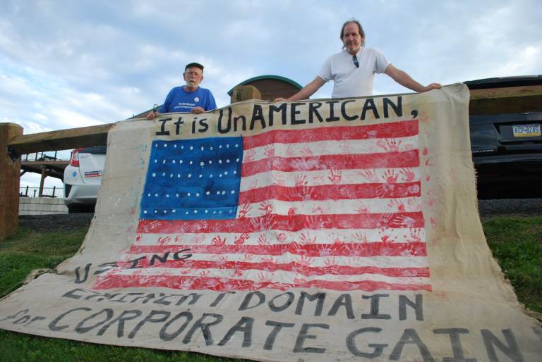 Roy Christman (left) and William Kellner, protested plans to build the PennEast natural gas pipeline at a FERC 'listening session' near Jim Thorpe, Pa. in 2016. FERC has now approved the project. (Jon Hurdle / StateImpact PA)