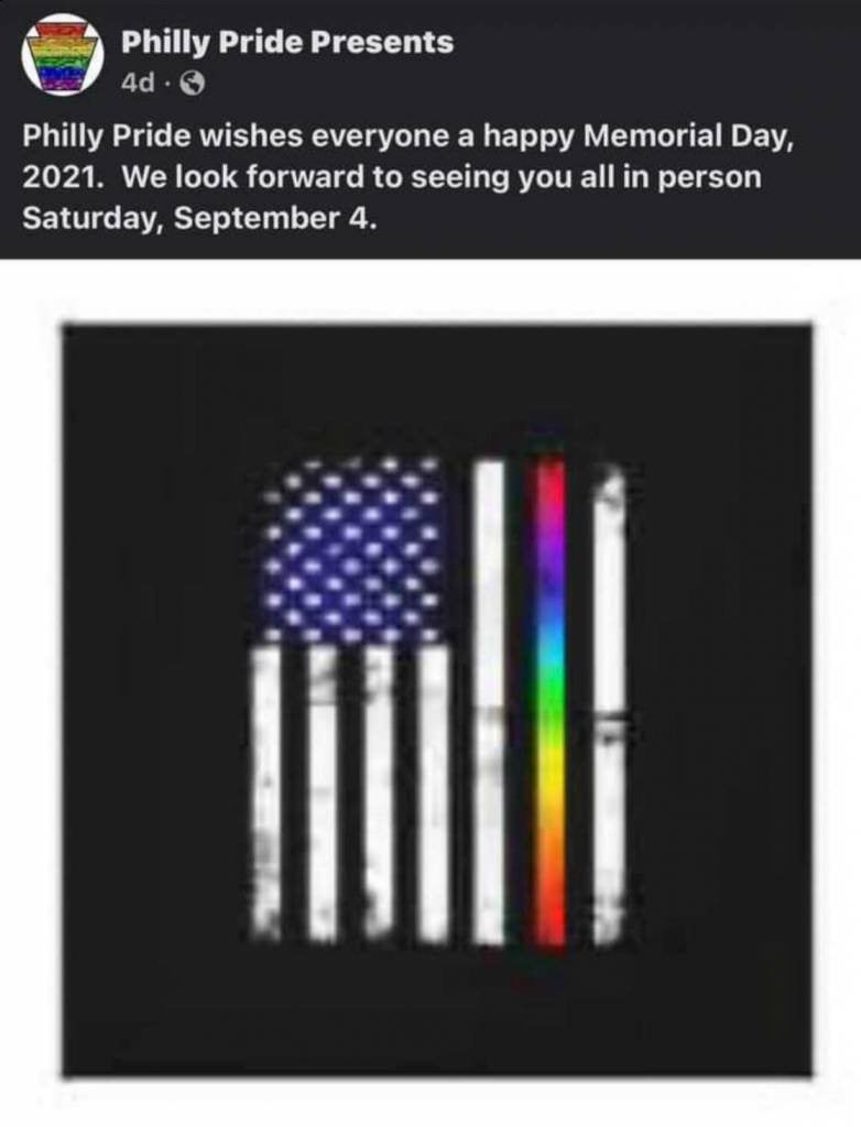 A screenshot of a Philly Pride Presents Facebook post that depicts a version of the Blue Lives Matter flag, replacing the blue stripe with a rainbow stripe