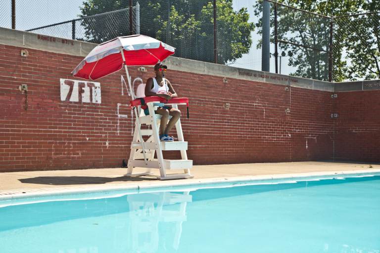 Breana Cooper on watch from the lifeguard stand