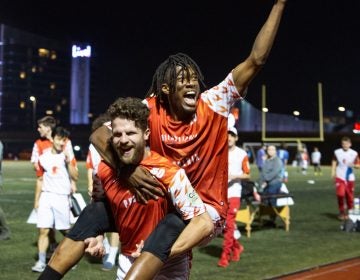 Veteran Phoenix Eric Witmer picks up newbie Phoenix player Nate Little in celebration after their 21-16 win over the Tampa Bay Cannons at the South Philadelphia SuperSite, June 4th 2021. (Emily Cohen for Billy Penn)