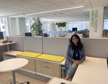 Renuka Iyer sits in an empty office