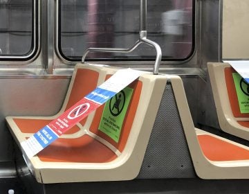 Social distancing signage on SEPTA. (Billy Penn / WHYY)