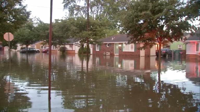 Houses are pictured amid heavy floodwaters.