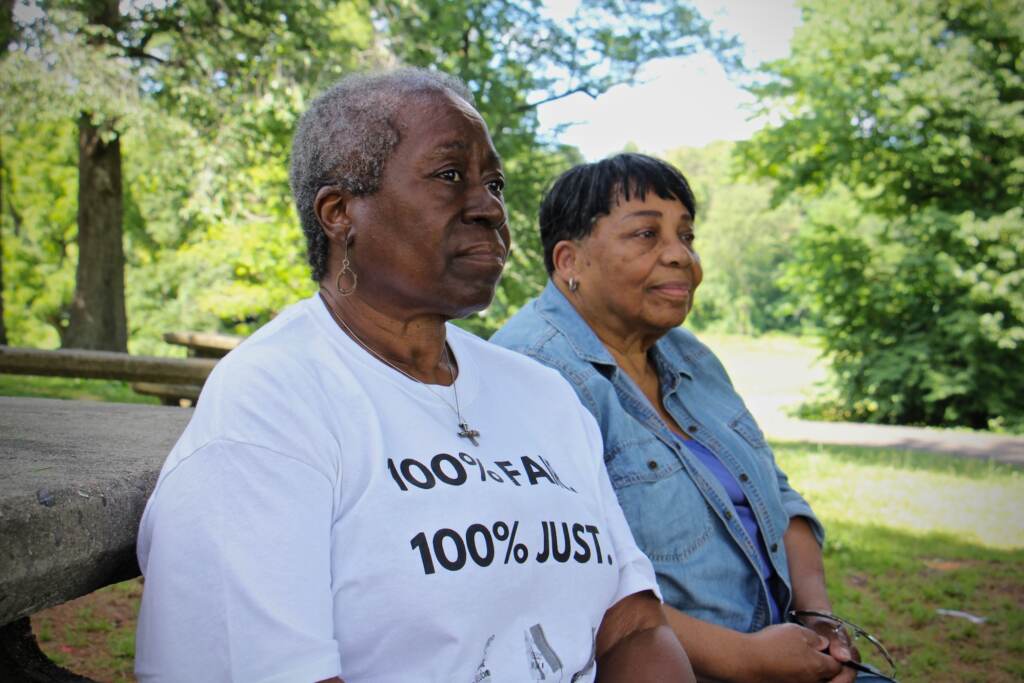 Frances Upshaw (left) and Paula Paul share a bench in Fernhill Park