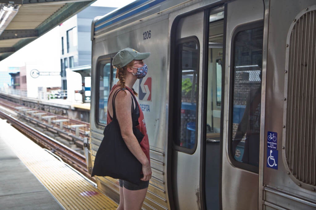 Ruby Tumaz boards a Market-Frankford Line train