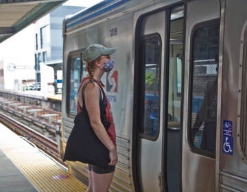 Ruby Tumasz boards a Market-Frankford Line train