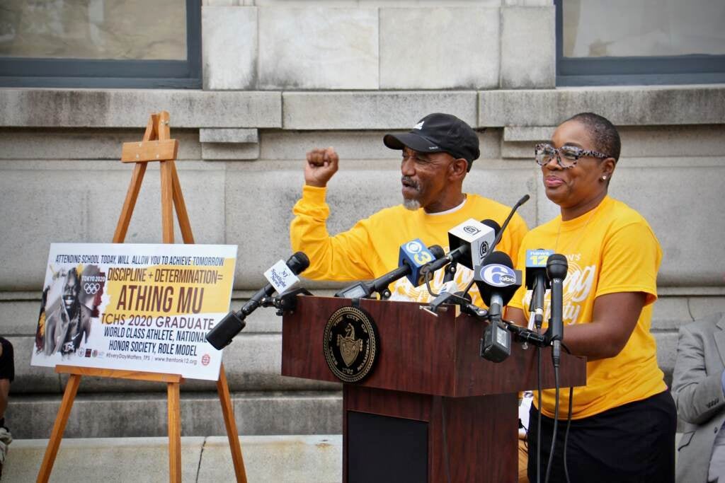 Al Jennings and Bernice Mitchell speak from a podium at Trenton City Hall