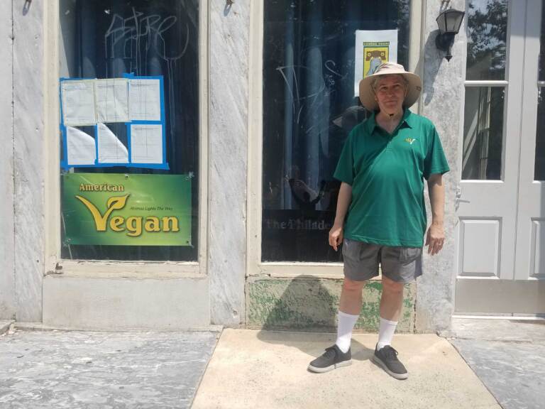 Vance Lehmkuhl stands outside the American Vegan Society space on 2nd Street