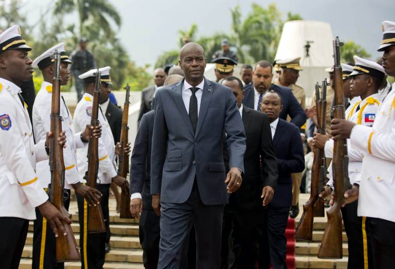 Haiti's President Jovenel Moise exist a museum with armed people flanked on both sides