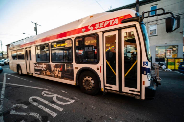 A SEPTA bus travels down a street in Philadelphia