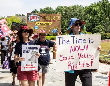 Voters in Philadelphia rallied in support of the For The People Act outside the National Constitution Center during a speech given by President Joe Biden. (Kimberly Paynter/WHYY)