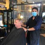 Diego Rivera cuts Michael Kane’s hair