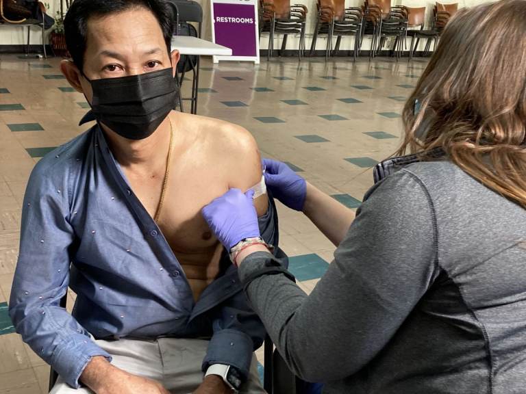 Tun Aye receives his COVID-19 vaccine